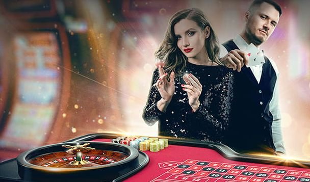 Casino Hold'em live-dealer table on qqslot login mobile showing dealer, hole cards, and community cards